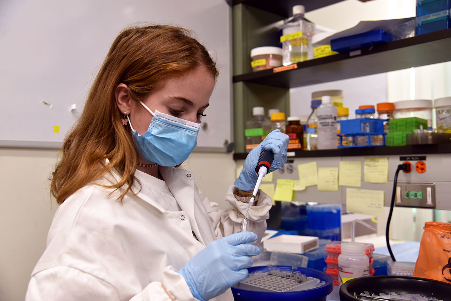 Abigail Interrante works in a lab in the Advanced Technology Laboratory.