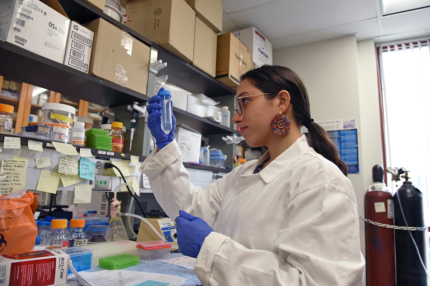 Adriana Suria ‘24 (CAHNR), working in a research lab in the Advanced Technology Laboratory